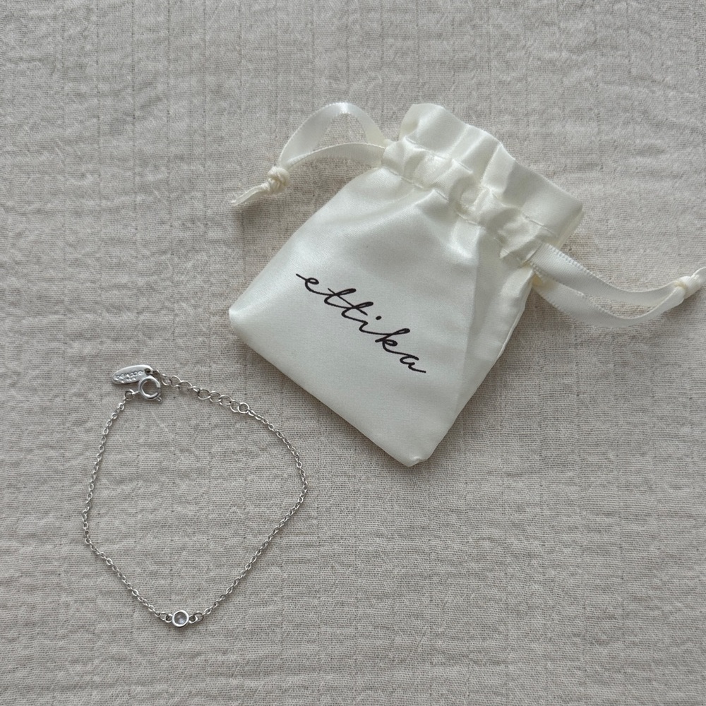 Ettika Silver Delicate Bracelet with Cream Pouch